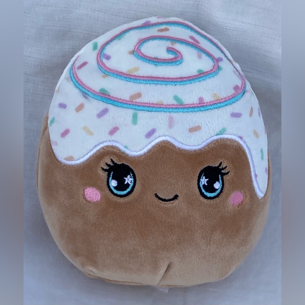 This is Squishmallows "Chanel the Cinnamon Roll" 5 1/2 inch plush scented toy.